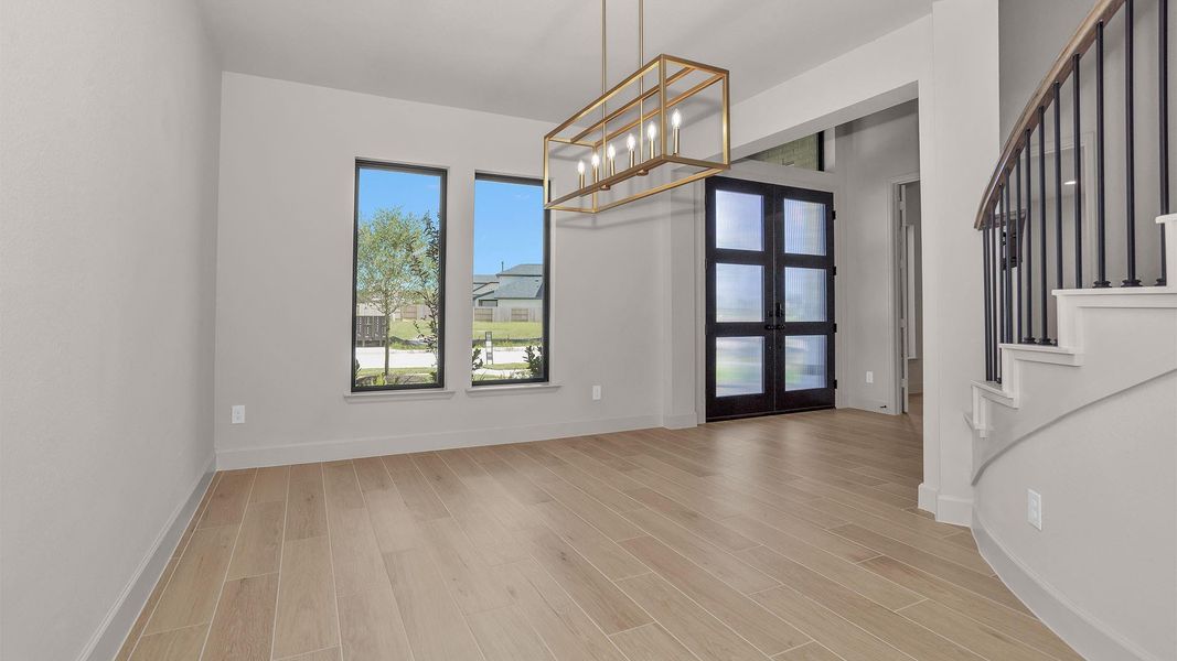 Spacious, unfurnished interior of a new home in Legacy Prairie at Katy Court, Katy (Image 10).