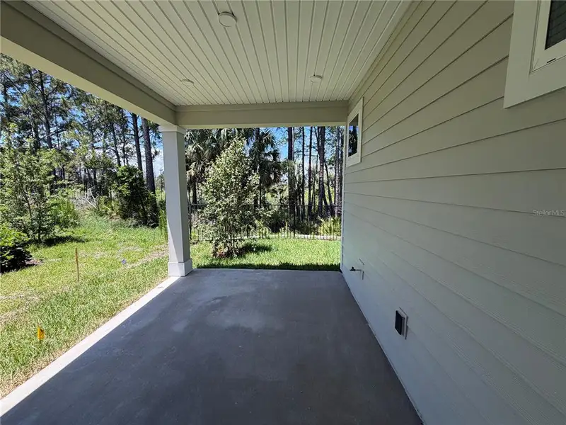 Exterior details and patio area of a home in Reserve East, Flagler Beach (Image 4).