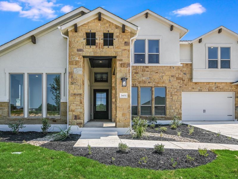 Representative exterior photo of a completed home built from the Topaz II by Giddens Homes in Riverstone, Georgetown, TX (Image 31).