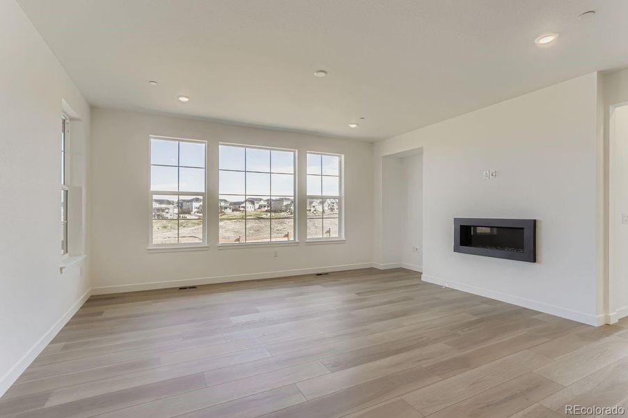 Spacious, unfurnished interior of a new home in Sunset Village: The Grand Collection, Erie (Image 8).