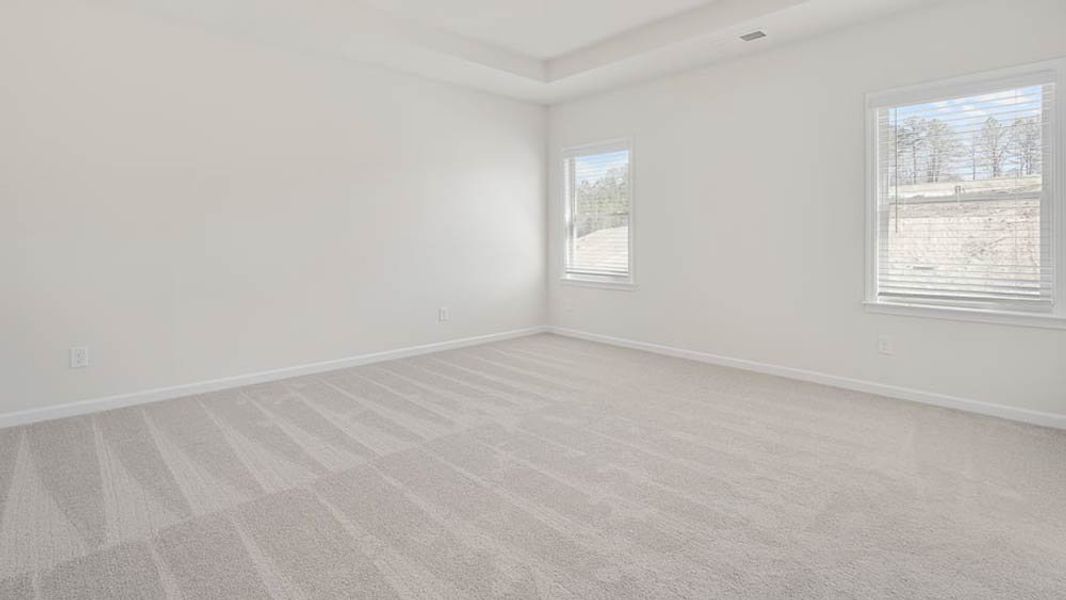 Representative unfurnished interior of a home built from the Ingram by Taylor Morrison in Falls Creek, Flowery Branch (Image 18).