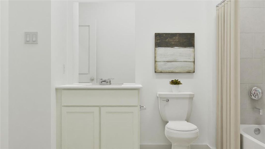 Bathroom featuring vanity and  shower combination