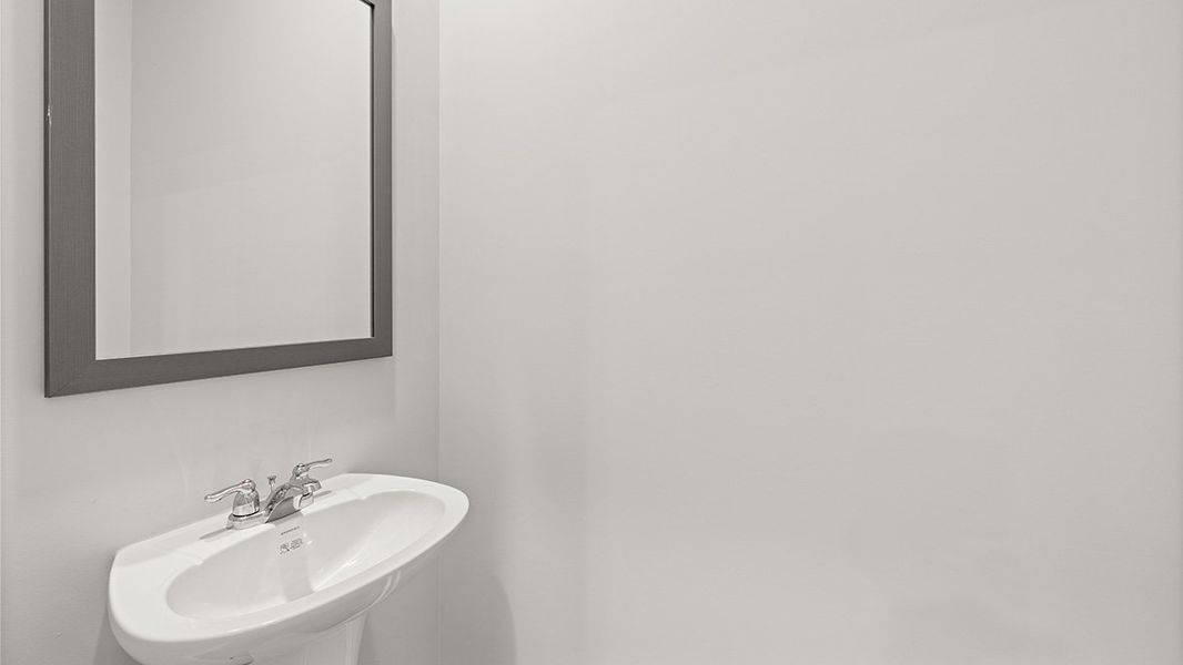 Representative furnished interior of a home built from the AMESBURY by D.R. Horton in Waypoint, Flowery Branch (Image 9).