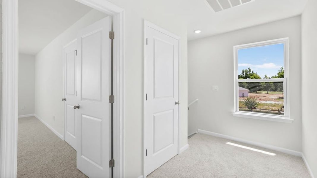 Spacious, unfurnished interior of a new home in Varner Station, Woodruff (Image 28).