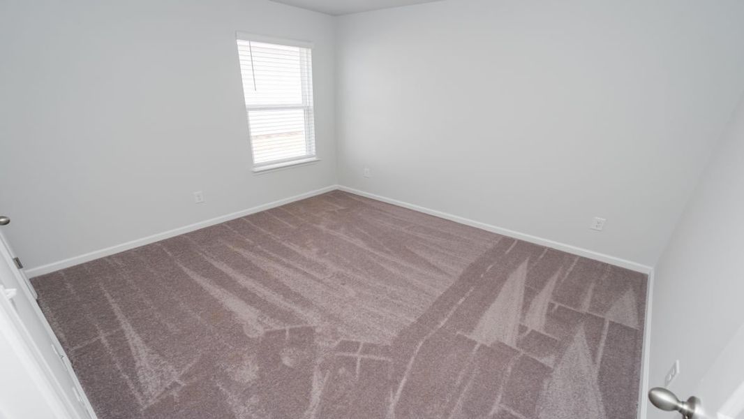 Representative unfurnished interior of a home built from the ARIA by D.R. Horton in Stanbury Creek, Supply (Image 12).