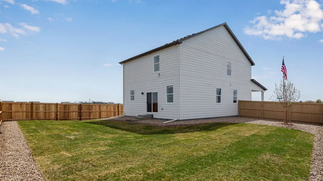 Exterior details and patio area of a home in Granary, Johnstown (Image 4).