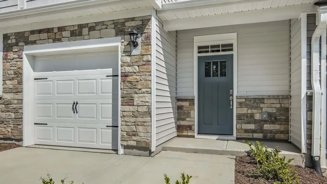 Exterior details and patio area of a home in Chapel Townes, Raleigh (Image 3).