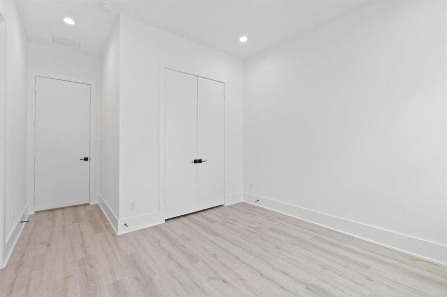 Third bedroom with double door closet.