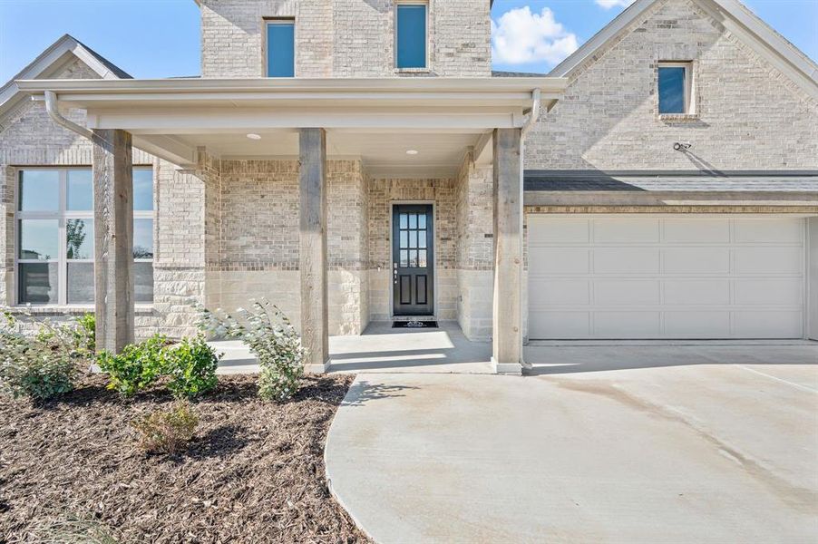 Exterior details and patio area of a home in Settlers Glen, New Fairview (Image 4).