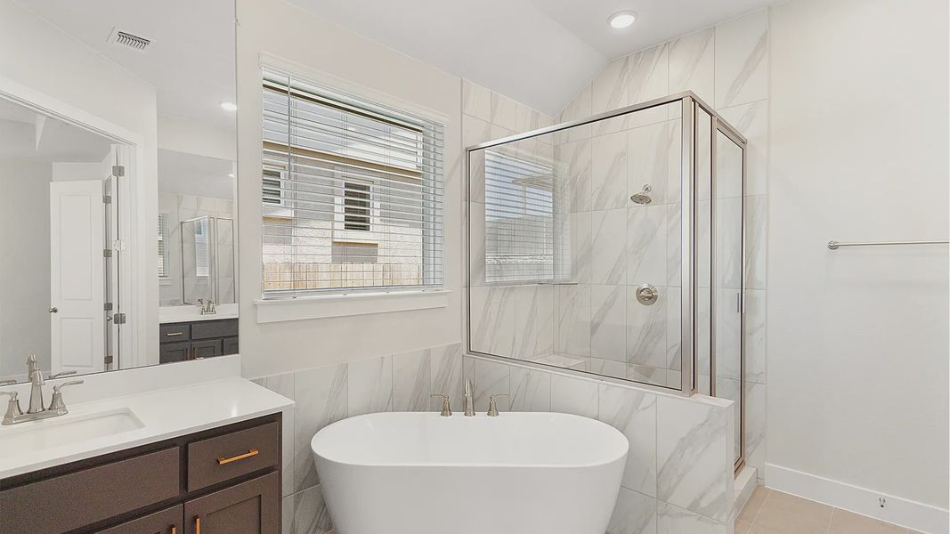 Representative furnished interior of a home built from the Brenner by Chesmar Homes in Newhaven, Manor (Image 13).