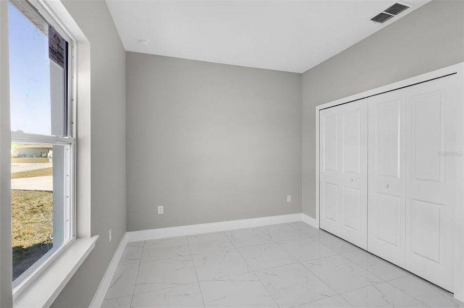Spacious, unfurnished interior of a new home in , Port Charlotte (Image 34).