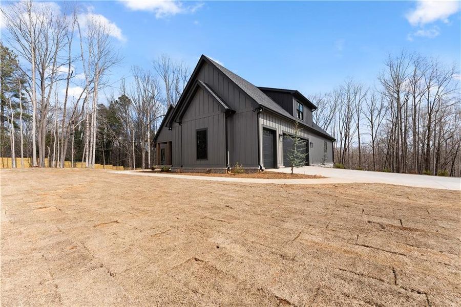 Front exterior of a new home in , Gainesville, GA, highlighting curb appeal (Image 25).
