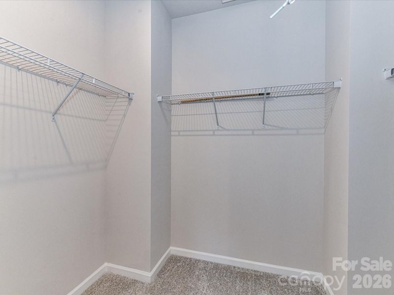 Primary walk-in closet