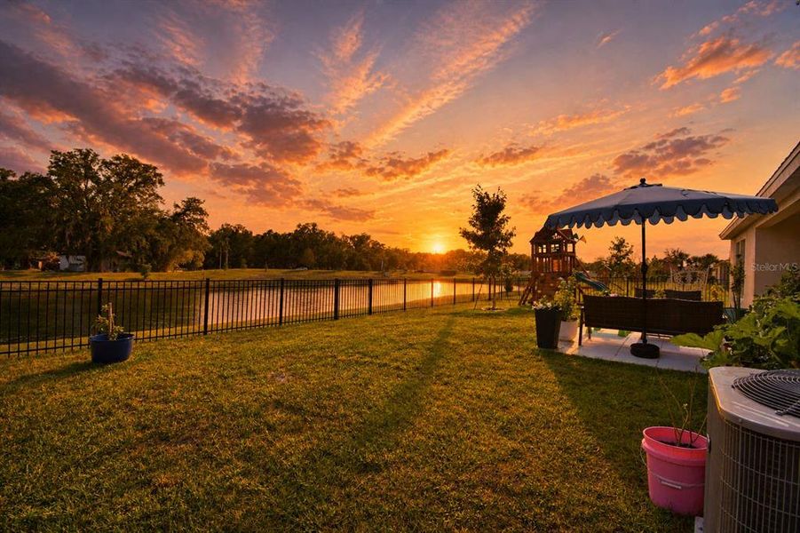 Exterior details and patio area of a home in Harmony at Lake Eloise, Winter Haven (Image 4).