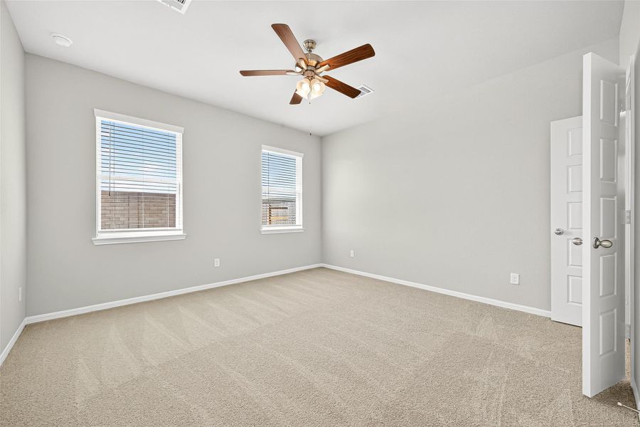 Spacious, unfurnished interior of a new home in Sunterra, Katy (Image 31).