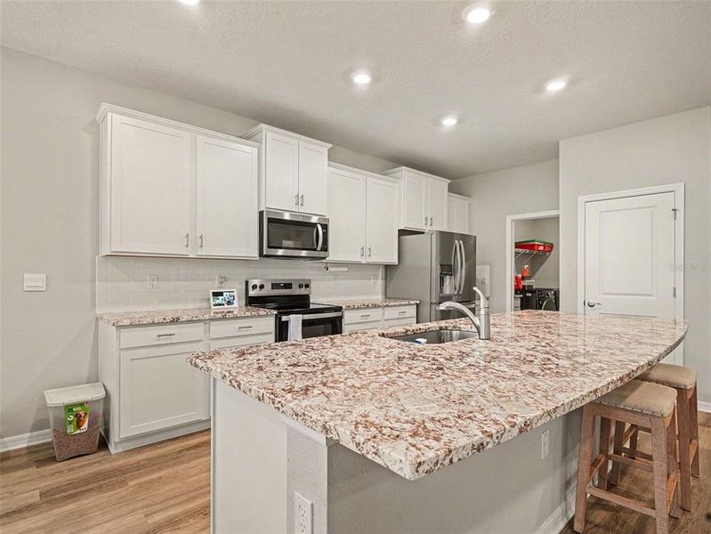 Furnished interior view inside a new home in Star Farms at Lakewood Ranch, Bradenton (Image 15).