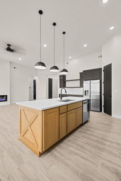 Representative furnished interior of a home built from the Pebble Beach- II by LEH. Homes in Verdancia, El Paso (Image 33).