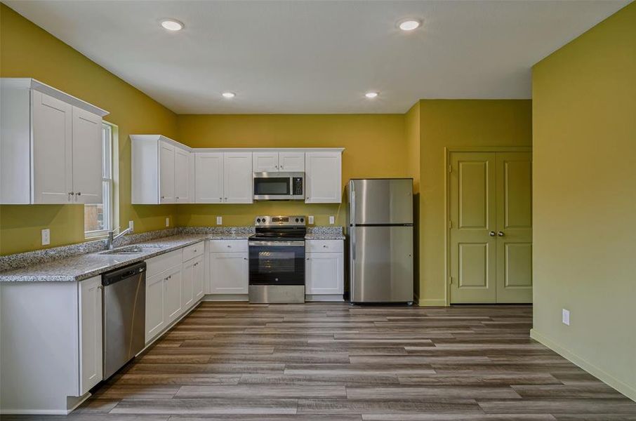 Furnished interior view inside a new home in Creekview Fossil Ridge, Pilot Point (Image 7).