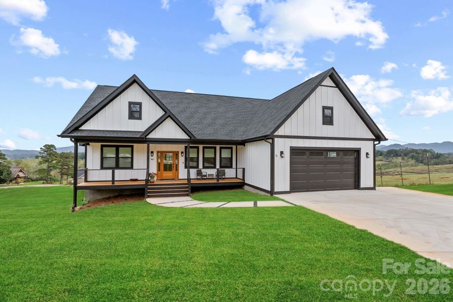 Front exterior of a new home in , Leicester, NC, highlighting curb appeal (Image 1). Front exterior of a new home in , Leicester, NC, highlighting curb appeal (Image 1).