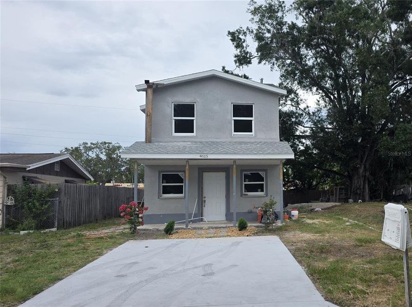 Front exterior of a new home in , Holiday, FL, highlighting curb appeal (Image 20).