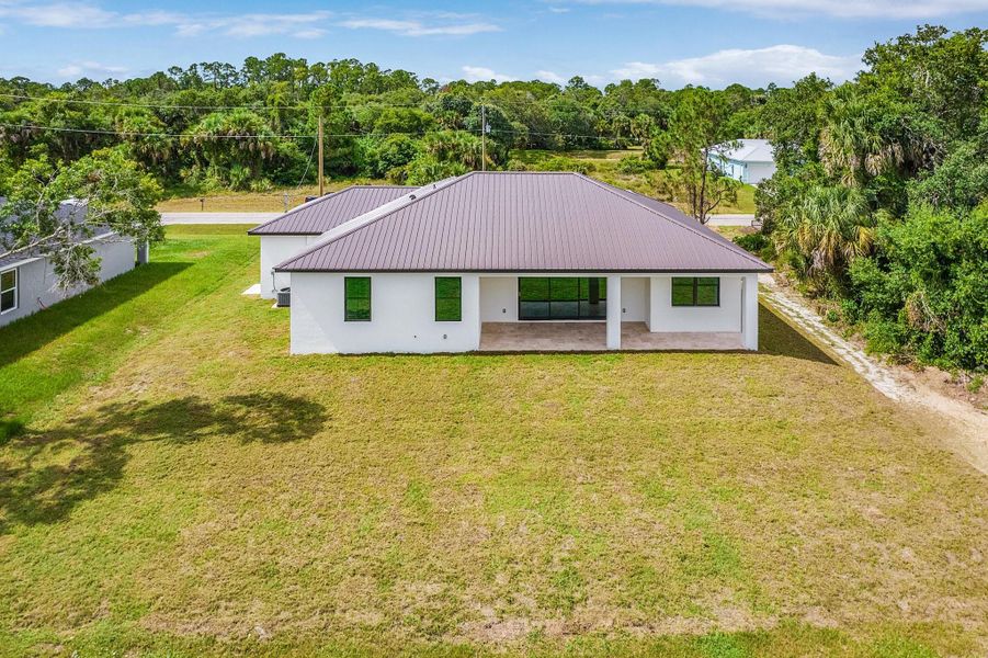 Front exterior of a new home in , Labelle, FL, highlighting curb appeal (Image 21). Front exterior of a new home in , Labelle, FL, highlighting curb appeal (Image 21).
