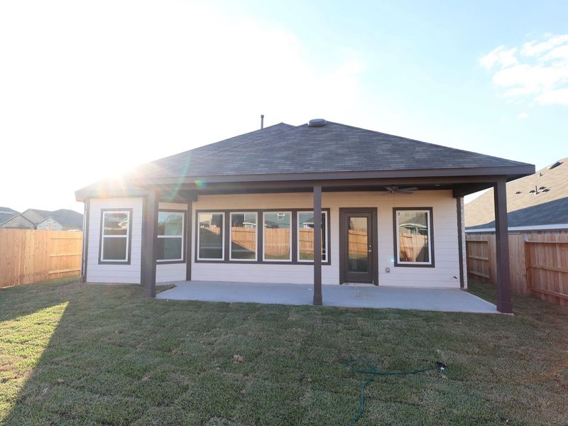 Exterior details and patio area of a home in Magnolia Ridge, Magnolia (Image 2). Exterior details and patio area of a home in Magnolia Ridge, Magnolia (Image 2).