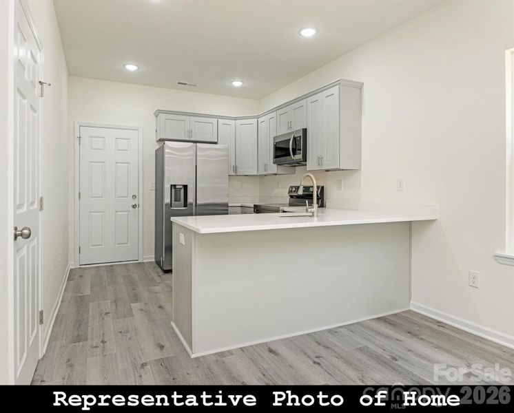 Furnished interior view inside a new home in , Charlotte (Image 4).