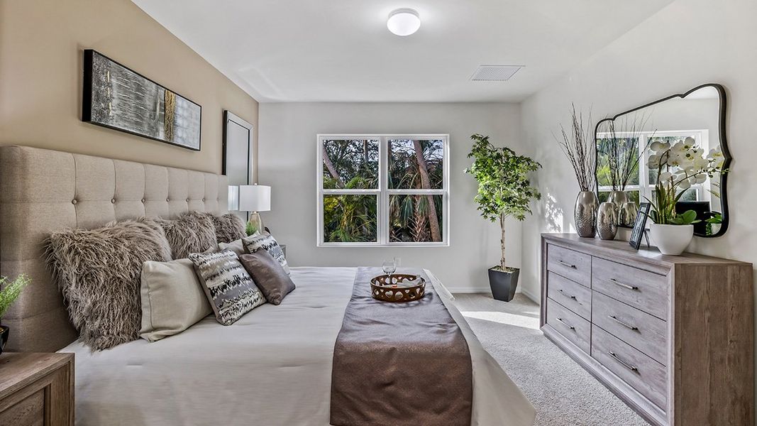 Representative furnished interior of a home built from the Cali by D.R. Horton in North Port - Express Series, North Port (Image 13).