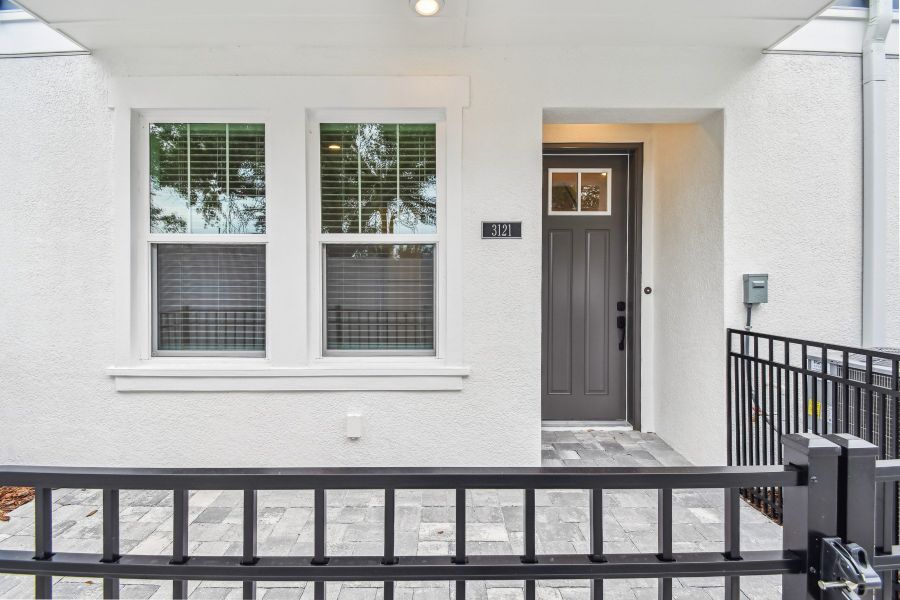 Exterior details and patio area of a home in Towns at Union, St. Petersburg (Image 2). Exterior details and patio area of a home in Towns at Union, St. Petersburg (Image 2).