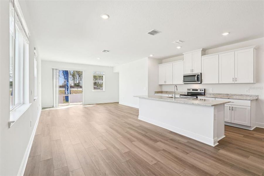 Furnished interior view inside a new home in Cyrene at Minneola - Villas, Minneola (Image 8).