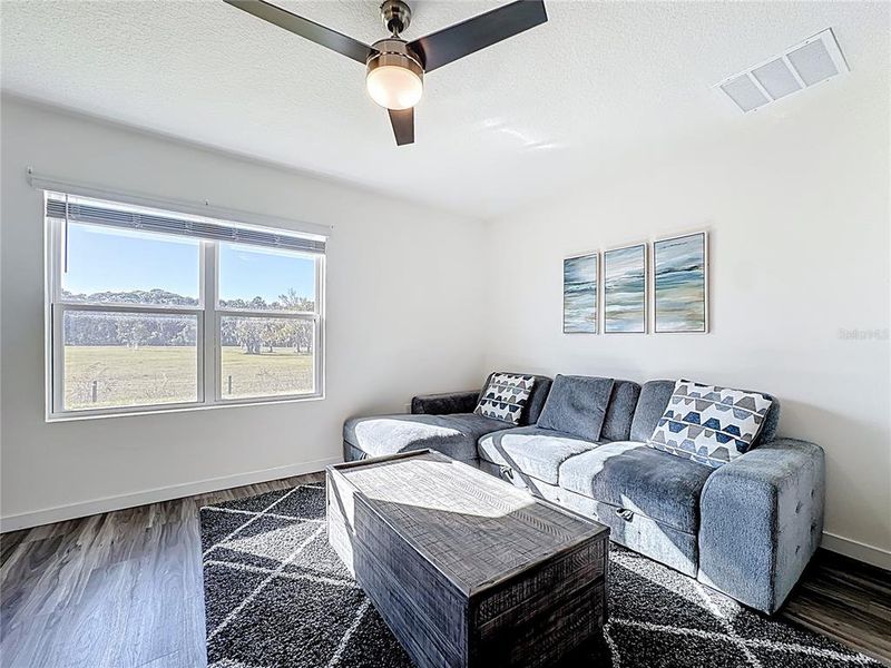 Furnished interior view inside a new home in , St. Cloud (Image 7).