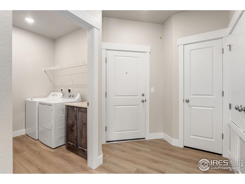 Laundry with built in cabinets and shelving Laundry with built in cabinets and shelving