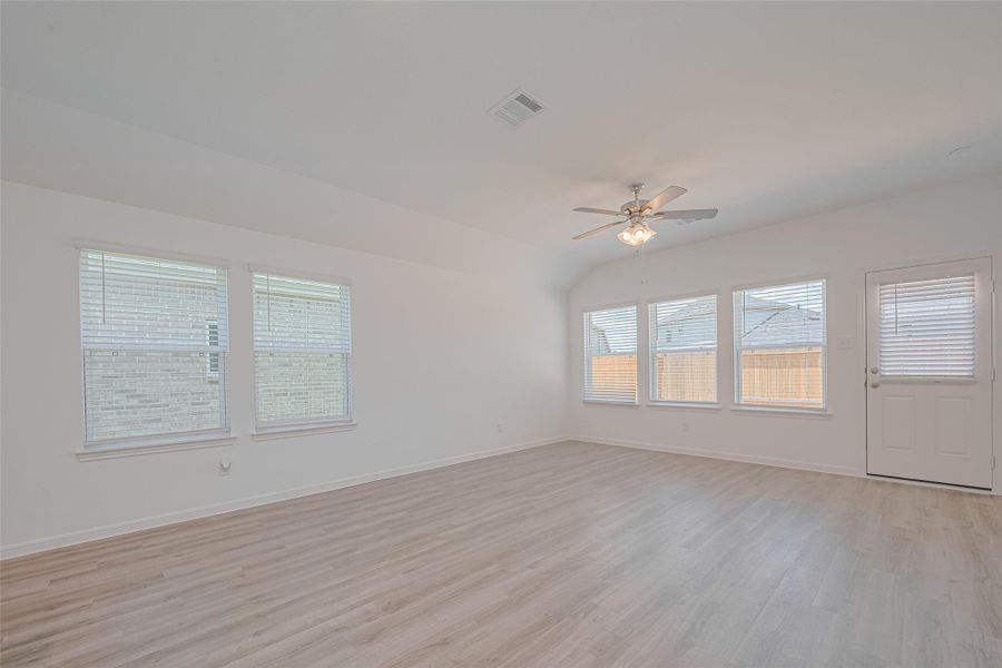 Spacious, unfurnished interior of a new home in Sunterra, Katy (Image 26).