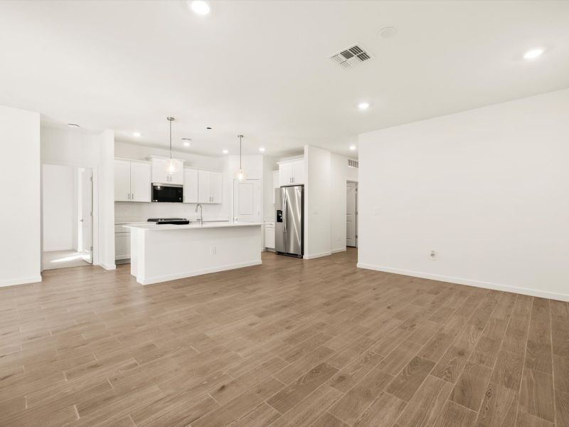 Spacious, unfurnished interior of a new home in Bella Vista Farms Estate Series, San Tan Valley (Image 8).