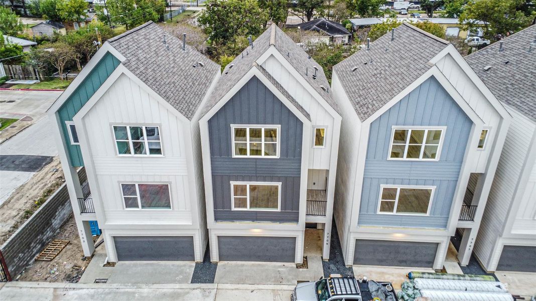 Front exterior of a new home in , Houston, TX, highlighting curb appeal (Image 1).