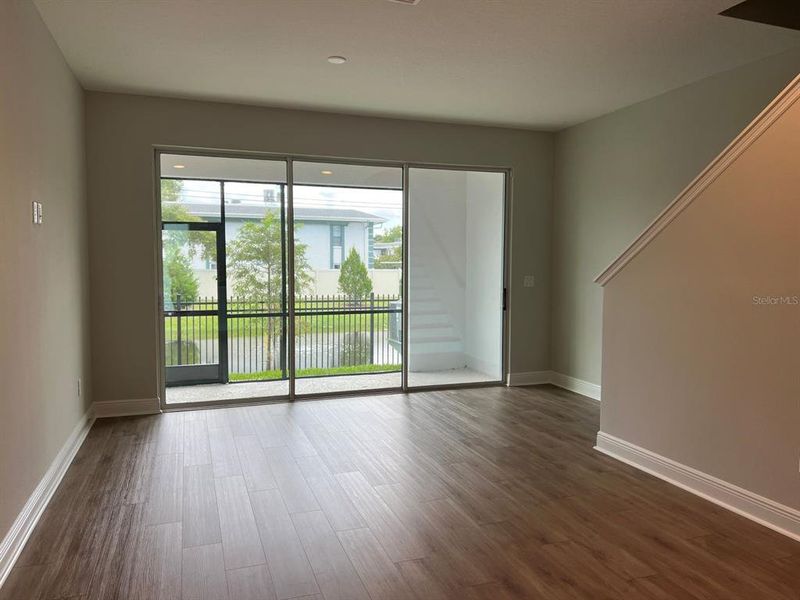 Spacious, unfurnished interior of a new home in The Towns At Long Bayou, Seminole (Image 14).