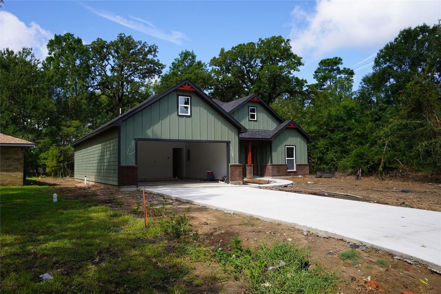 Front exterior of a new home in , Livingston, TX, highlighting curb appeal (Image 2). Front exterior of a new home in , Livingston, TX, highlighting curb appeal (Image 2).
