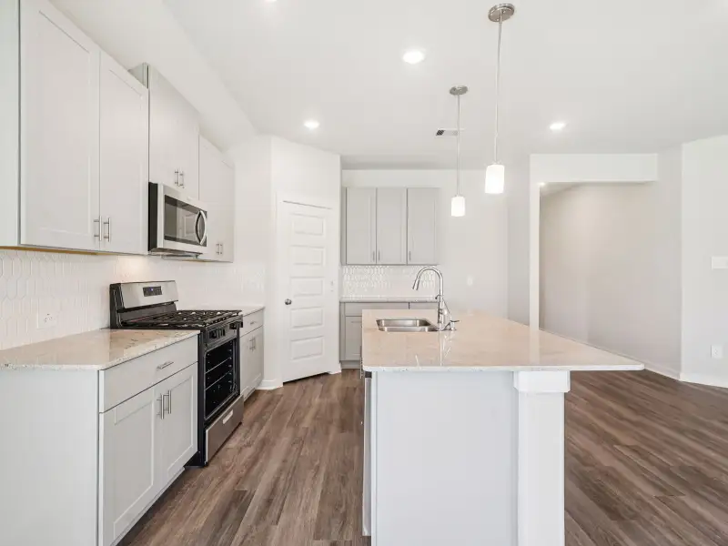 Furnished interior view inside a new home in Riviera Pines - Classic Series, Huffman (Image 5).