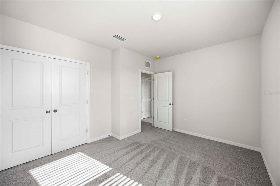 Spacious, unfurnished interior of a new home in Coddington, Bradenton (Image 53).