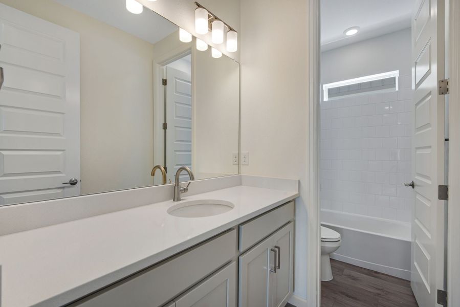 Furnished interior view inside a new home in The Aurora Highlands, Aurora (Image 14).