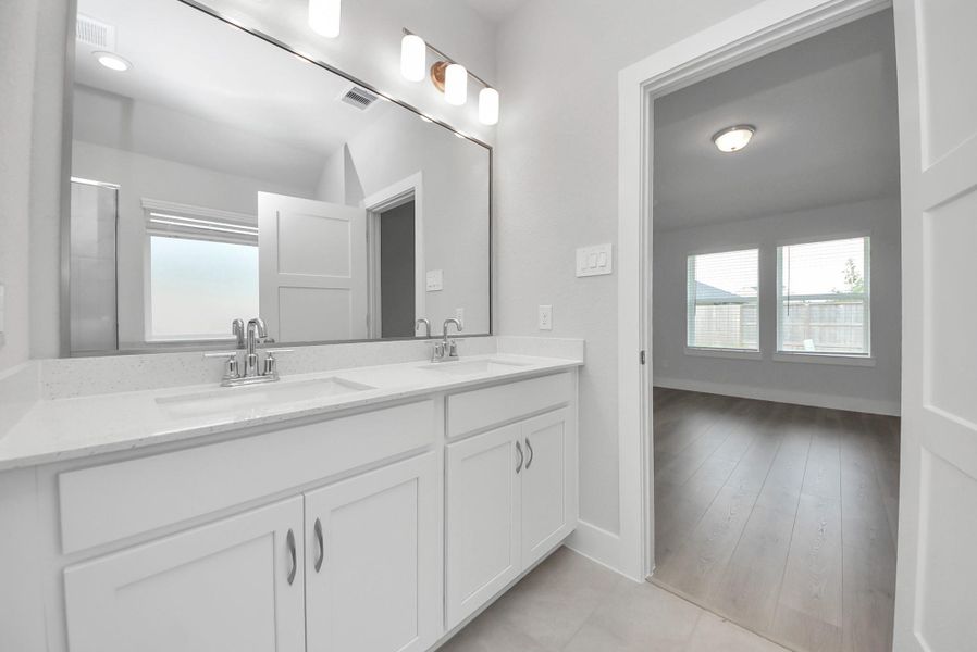 Furnished interior view inside a new home in Sunrise Cove: Landmark Collection, Texas City (Image 11).
