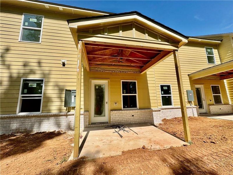 Exterior details and patio area of a home in Eastlyn Crossing, Flowery Branch (Image 4).