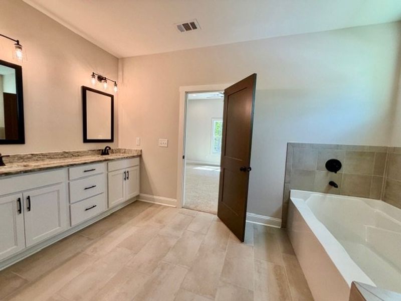 Furnished interior view inside a new home in Deer Creek, Moreland (Image 7).