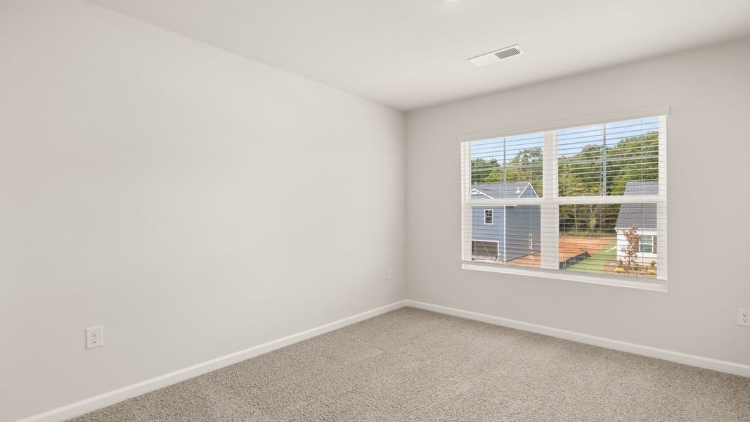 Spacious, unfurnished interior of a new home in Preserve at Dove Creek, Statham (Image 35).