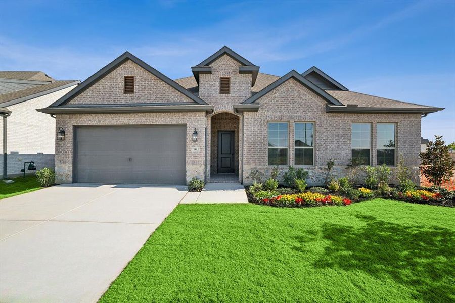 Front exterior of a new home in Wellington, Haslet, TX, highlighting curb appeal (Image 1).