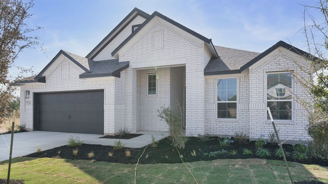 Front exterior of a new home in Highland Village, Georgetown, TX, highlighting curb appeal (Image 15).