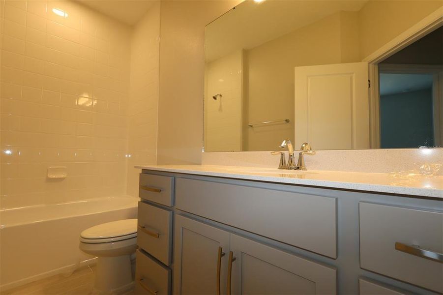 Furnished interior view inside a new home in Emerson Pointe, Apopka (Image 8). Furnished interior view inside a new home in Emerson Pointe, Apopka (Image 8).