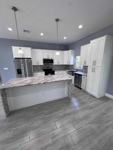 Furnished interior view inside a new home in , Palm Bay (Image 3).