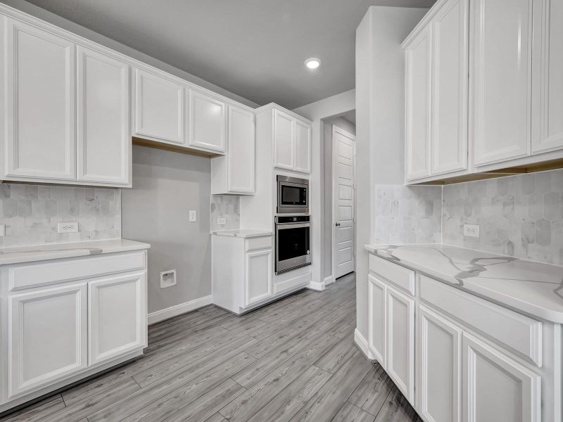 Photo is not of the actual home, but is an inspirational photo of builder’s model home and may depict options, furnishings, and/or decorator features that are not included