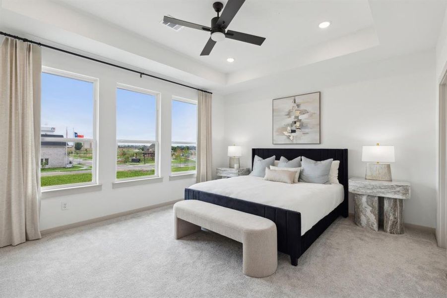 The peaceful owner's suite is located at the back of the home for additional privacy.